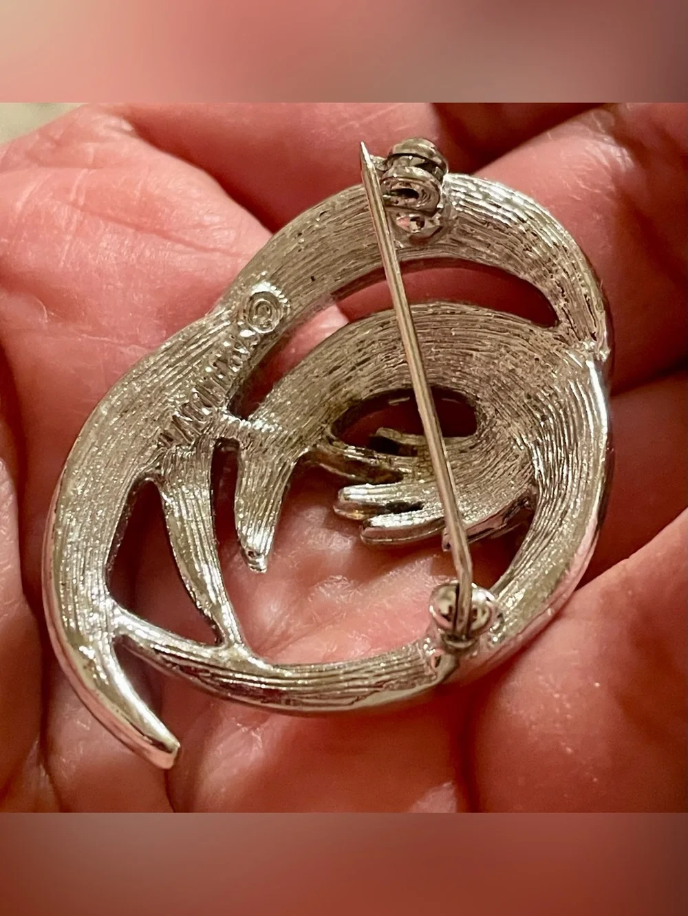 Sarah Coventry Sculpted Silver-Tone Feather Swirl Brooch